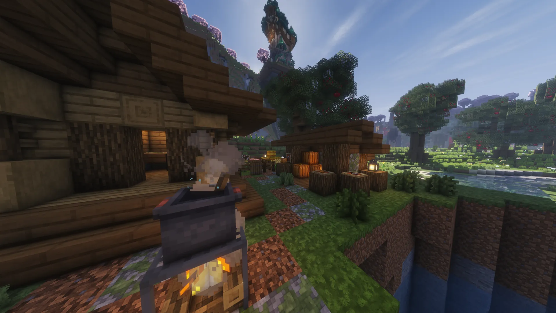 A detailed Minecraft² hillside workspace overlooking an orchard.