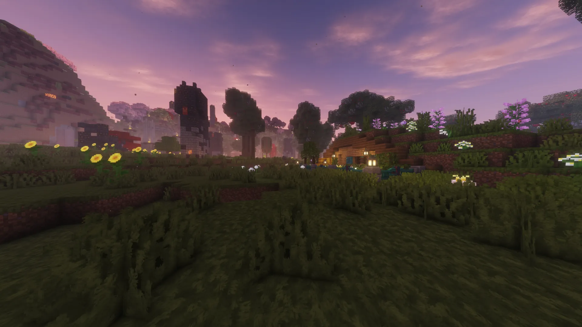 A quiet Minecraft² settlement under a rose-colored sky.
