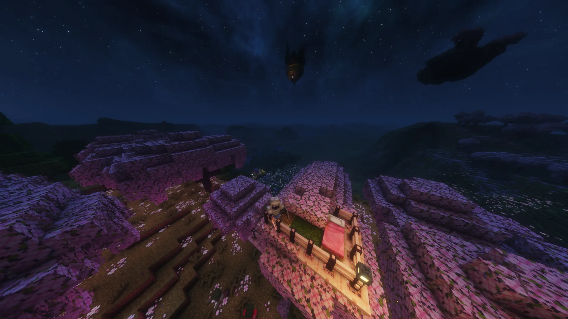A nighttime Minecraft² vista above flowering treetops and distant islands.